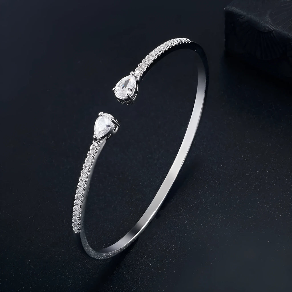 Copper bracelet with inlaid white or blue zircon crystals, simple fashion jewellery design