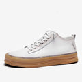 Men's black leather lace-up casual shoes with a round toe and flat rubber sole on a white background.