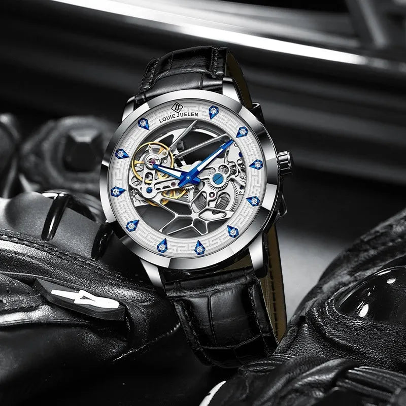 Men's silver mechanical watch with white dial, blue hands, and black leather strap