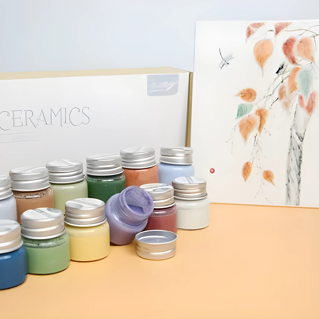Three pots of Morandi colour ceramic glaze paint in lilac, plant ash, and verdant for high-temperature pottery.