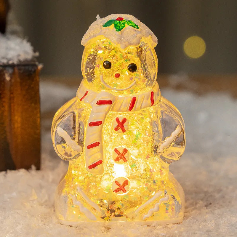 Set of four glowing plastic gingerbread man Christmas ornaments with red, white, and transparent scarves on a festive background.