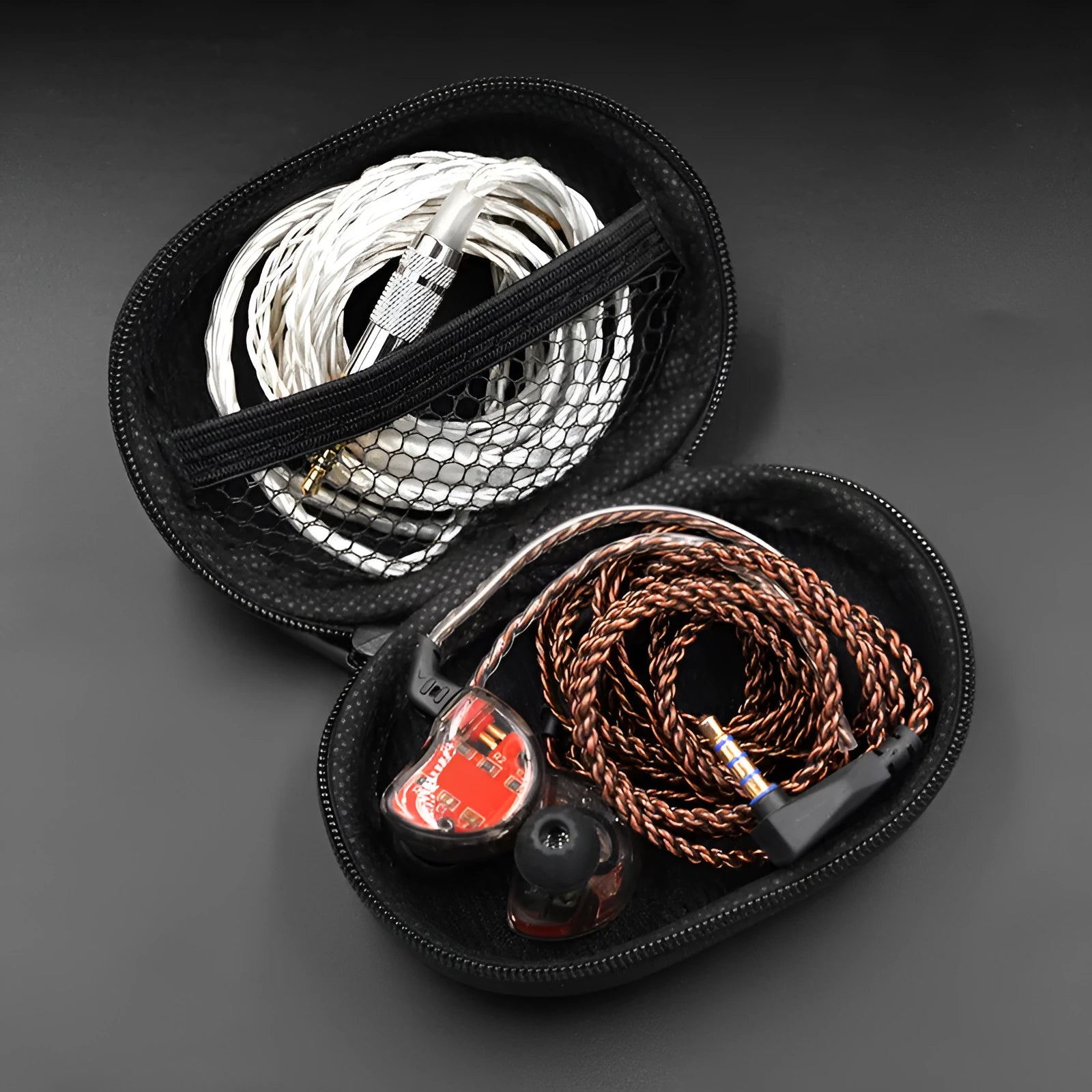 Black leather oval earphone storage case with magnetic closure for compatible earphone models