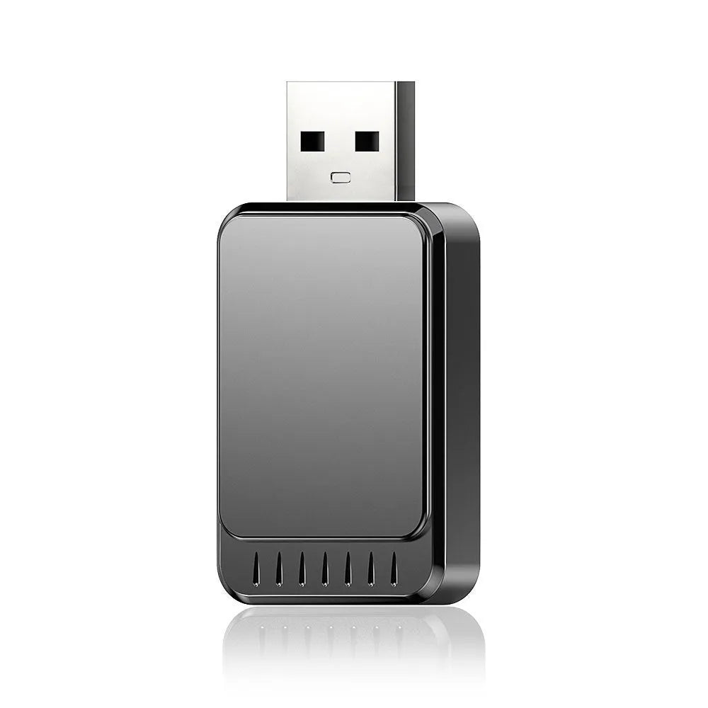 Wireless CarPlay and Android Auto 2-in-1 USB adapter box for car dashboard.
