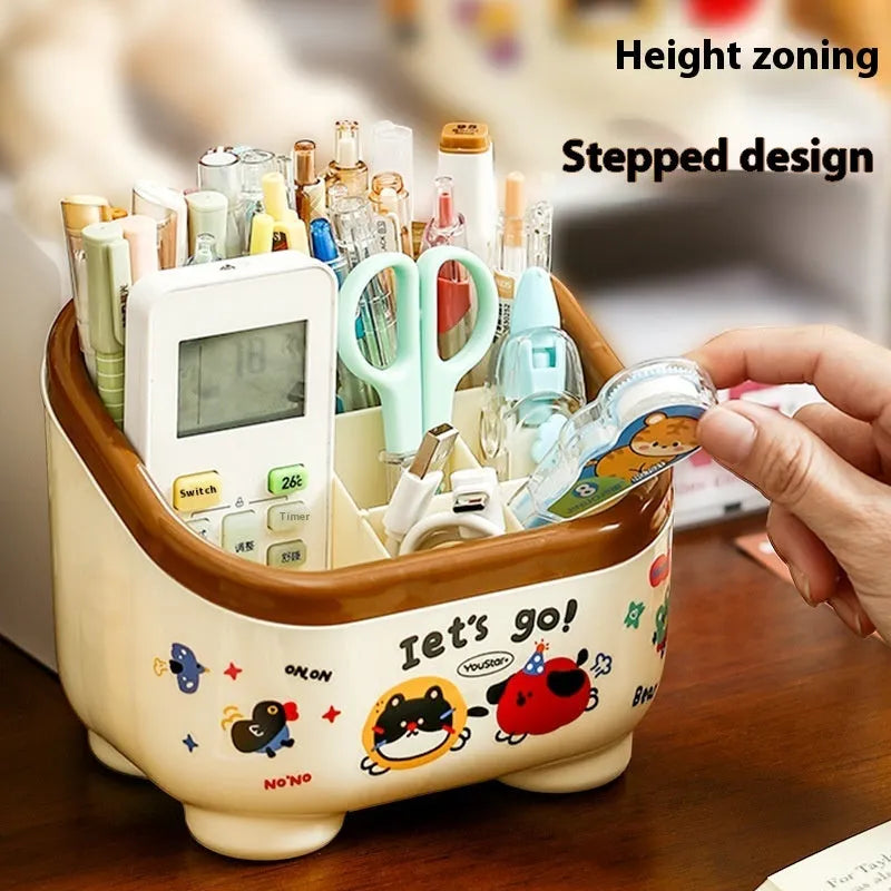 Cartoon style desktop storage organiser with multiple compartments including pen holders, storage boxes and flap trash can