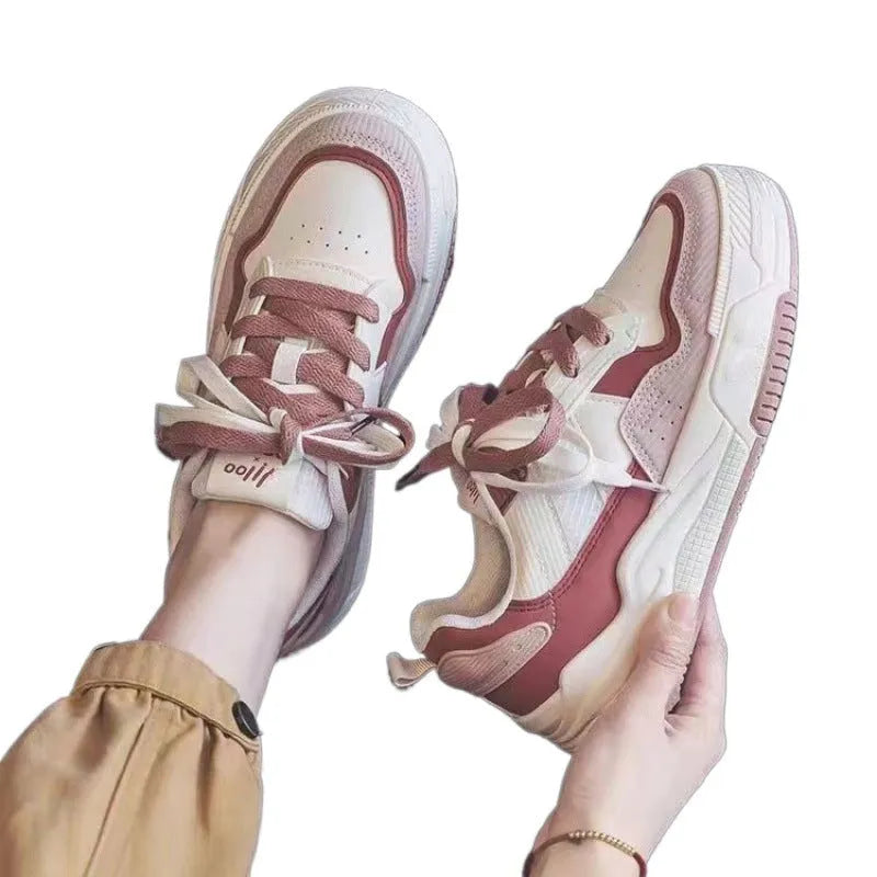 Beige and pink women's low-top rubber sneakers with a hidden height increase sole.