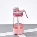 Grey plastic cup with integrated straw showing cylindrical shape and 1000ml capacity marking