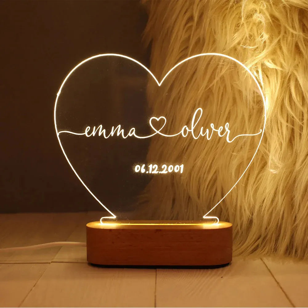 Personalised acrylic LED night light showing custom names and date, modern art design, 20cm by 11.5cm