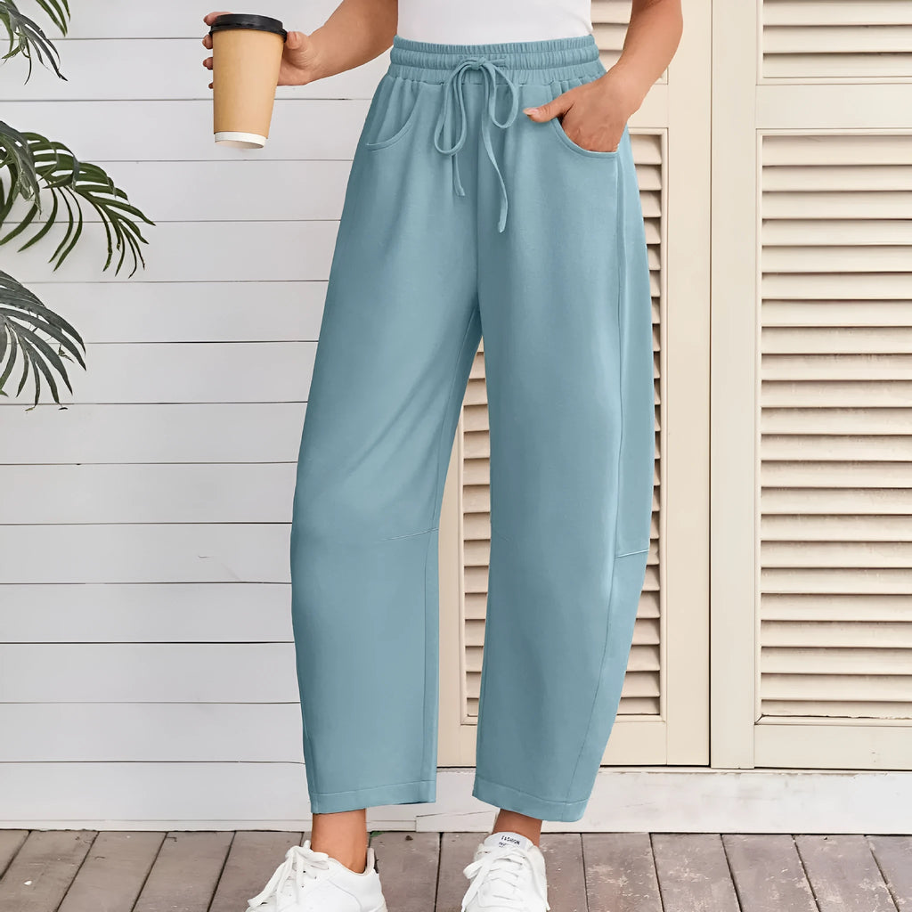Loose cropped sweatpants with drawstring waist in cotton blend fabric for streetwear fashion