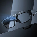 Black head-mounted smart glasses with a camera lens and touch controls on the frame.