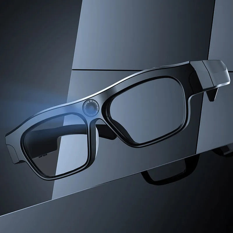 Black head-mounted smart glasses with a camera lens and touch controls on the frame.