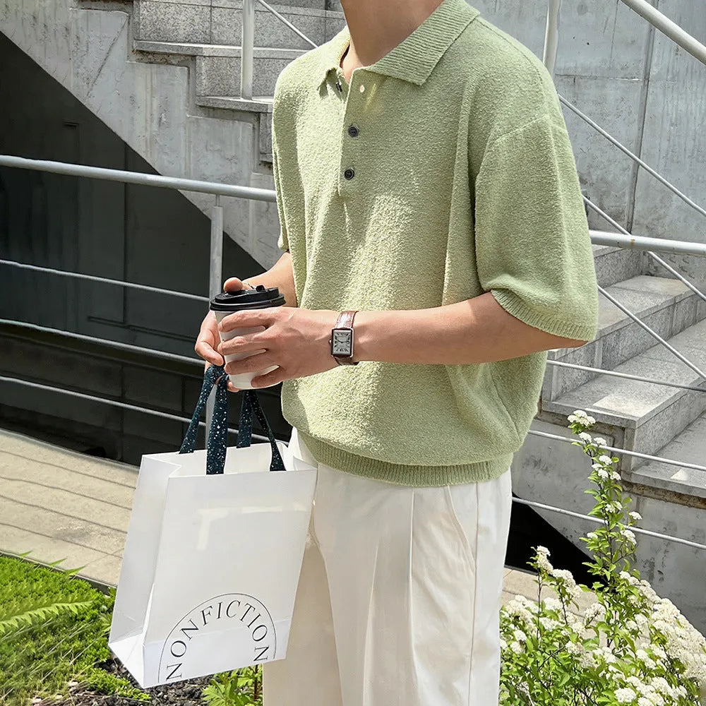 Retro style men's caramel knitted polo shirt with asymmetrical design and short sleeves.