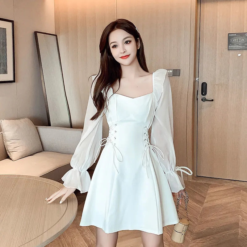 White women's chiffon dress with waist-slimming design and long sleeves