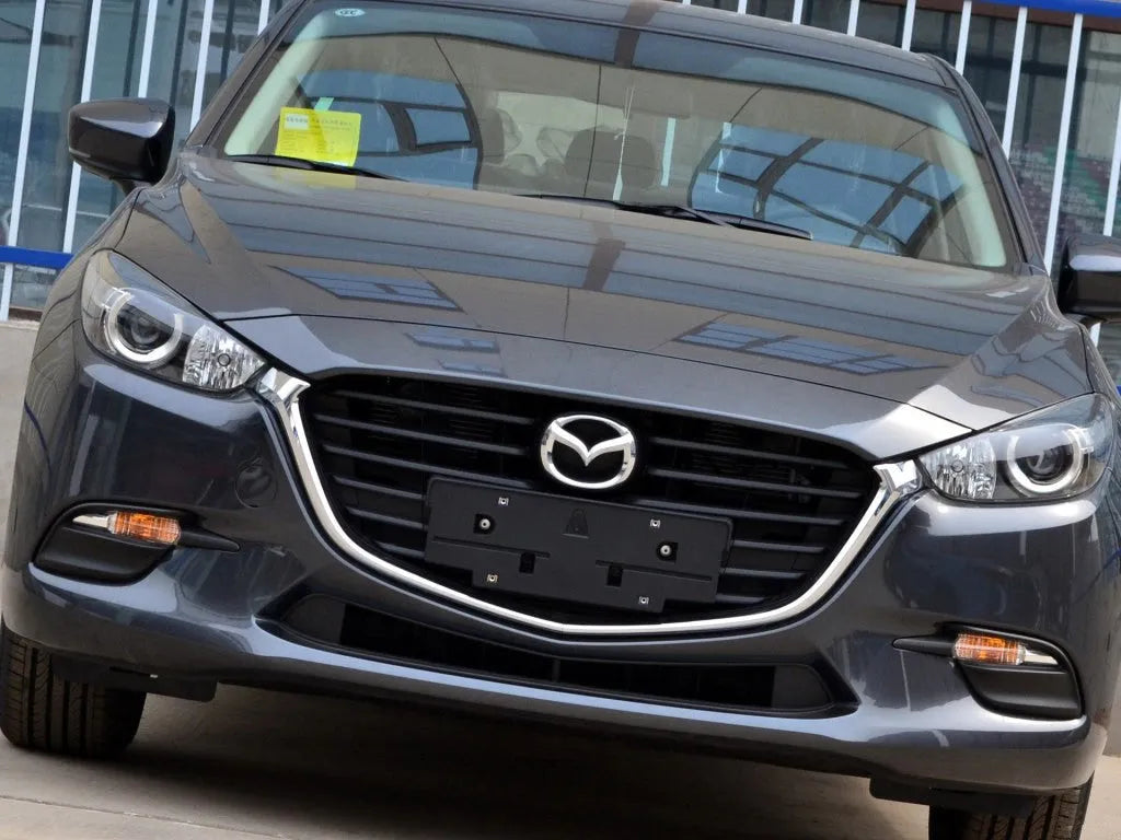 Mazda 3 headlight replacement cover with pre-applied adhesive for 14-16 and 17-19 Exela models.