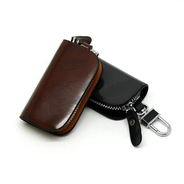 Genuine leather car key case with frosted finish in black and brown colours.