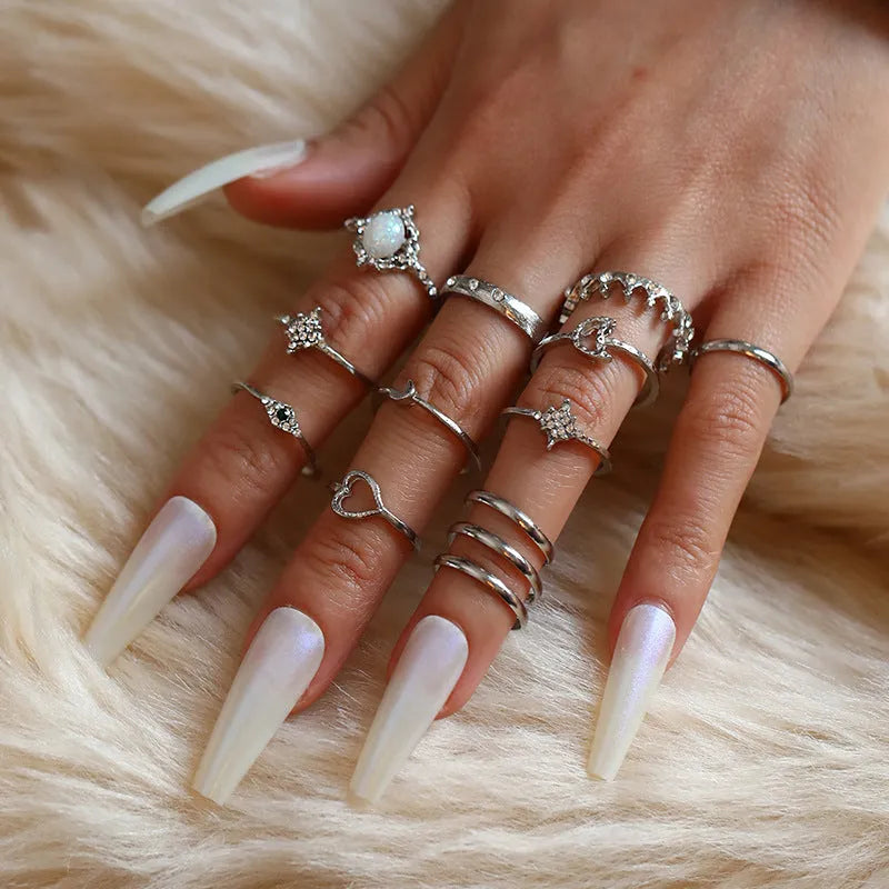 Vintage star moon rhinestone ring set of 13 pieces in gold and silver on display