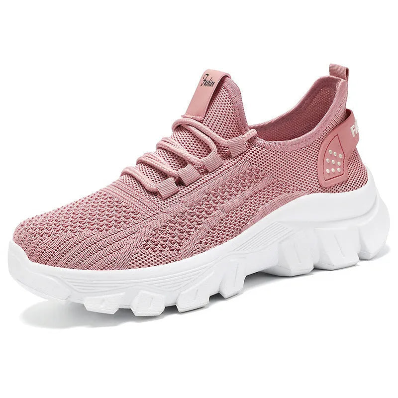 Men's white Flyknit running sneakers with thick PVC sole and lace-up closure