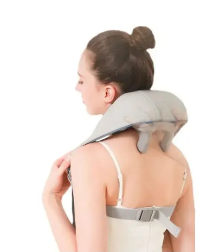 Milky white rechargeable shoulder and neck massager unit with USB charging cable.
