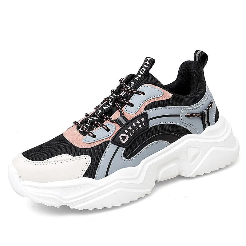 Women's white casual sports shoes with mesh upper, thick PU sole, buckle detail, and round toe.