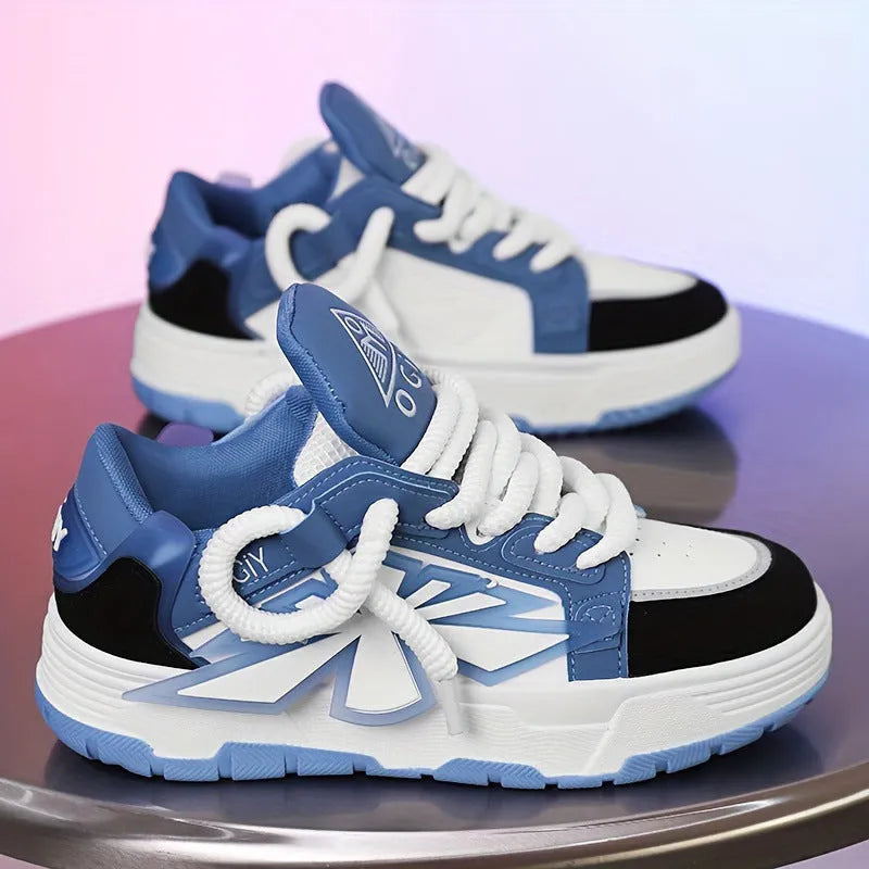Men's white chunky sneakers with cartoon design, thick rubber sole, and lace-up front.