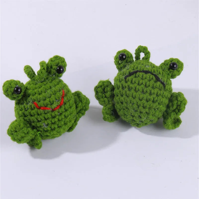 Handmade green plush frog woven car pendant hanging, showing soft texture and cartoon design.