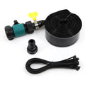 Blue portable garden sprinkler with PVC switch on a green lawn.