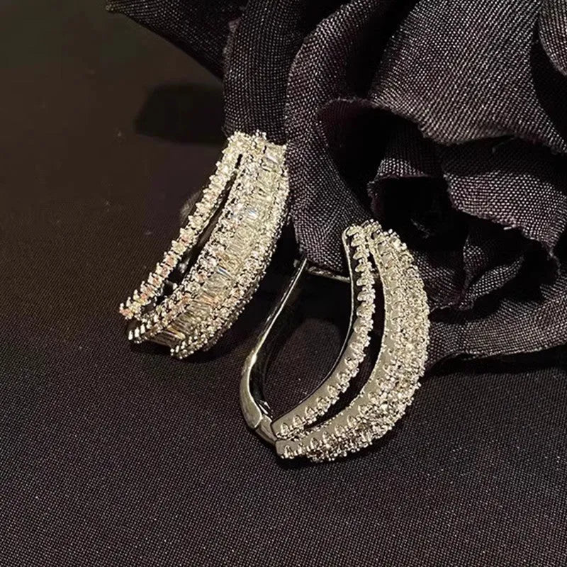 Geometric white gold colour stud earrings with zircon inlaid detailing for women