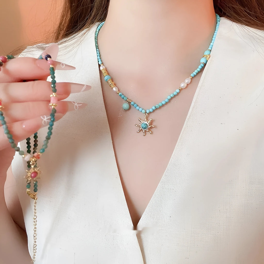 Freshwater pearl necklace with stone pendant and sun charm in geometric French royal court style