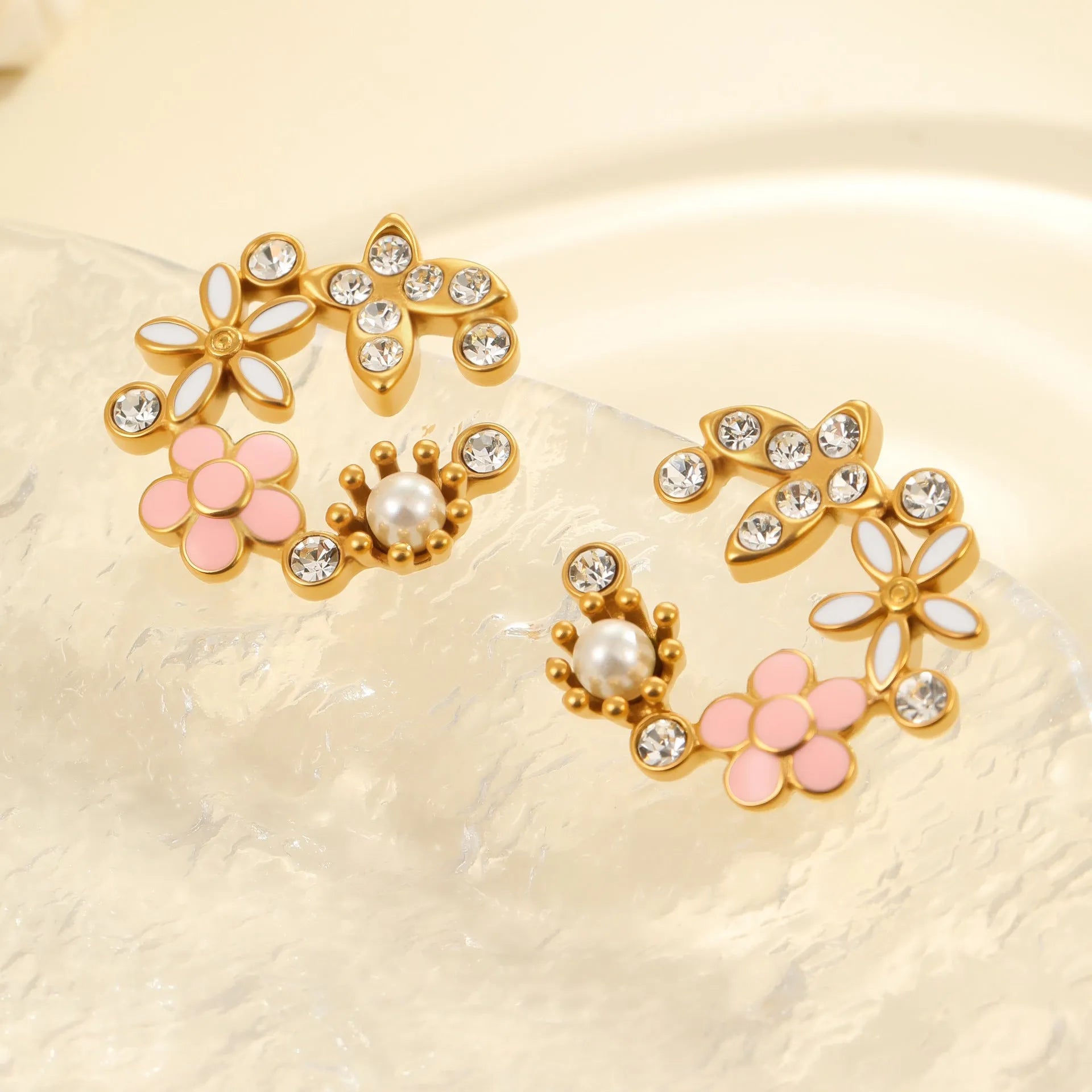 Stainless steel flower stud earrings with 18K gold electroplating and colourful oil diamond petal design