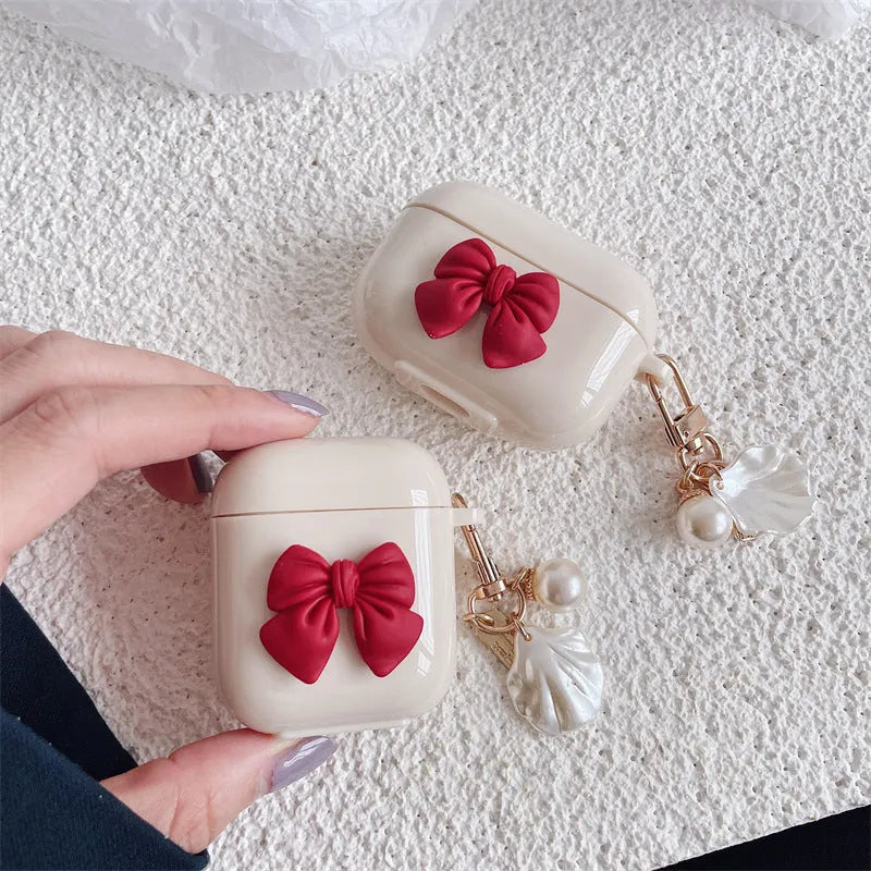Beige red TPU clamshell earphone case with bow shell design for AirPods protection