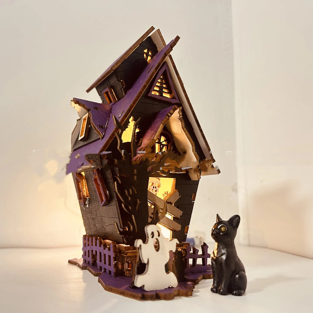 Wooden Halloween haunted house decoration with luminous finish on tabletop