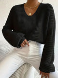 Women's long sleeve polyester pullover top in a solid colour with loose casual fit.