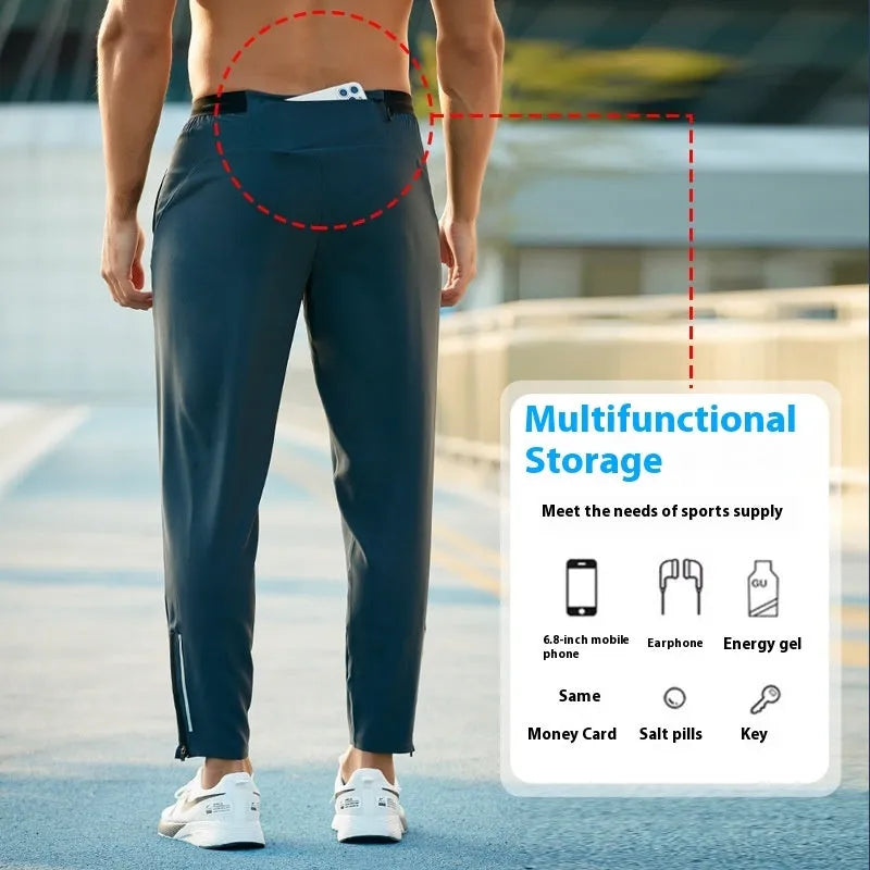 Men's loose quick-drying polyester sports trousers in navy blue, mid-waist with an American style cut for running and fitness