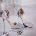 Gold and silver stiletto heel pumps with beaded and belt decoration on a solid-colour upper