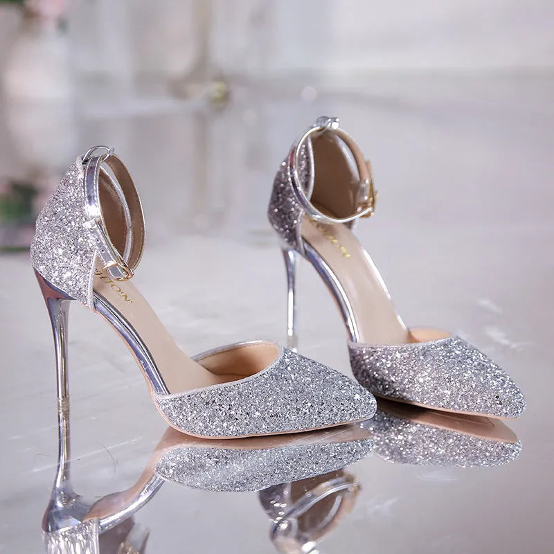 Gold and silver stiletto heel pumps with beaded and belt decoration on a solid-colour upper