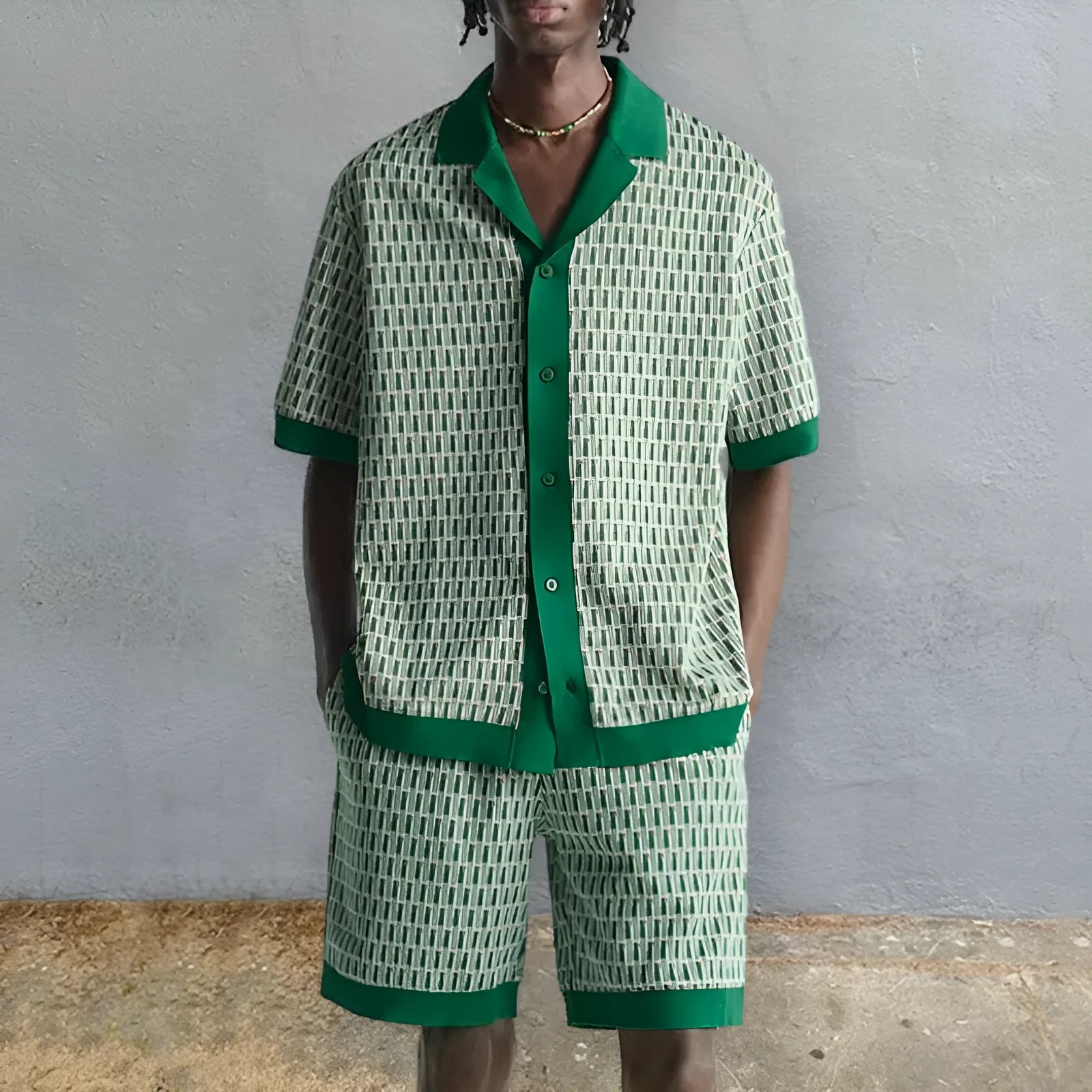 Men's plus size two-piece set with a printed short-sleeve shirt and elastic polyester shorts on a beach.