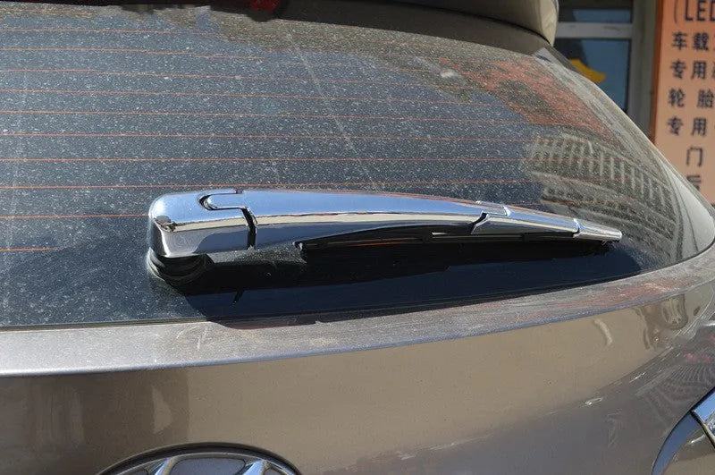 Four silvery ABS plastic rear wiper cover trim caps for a 2010 Hyundai.