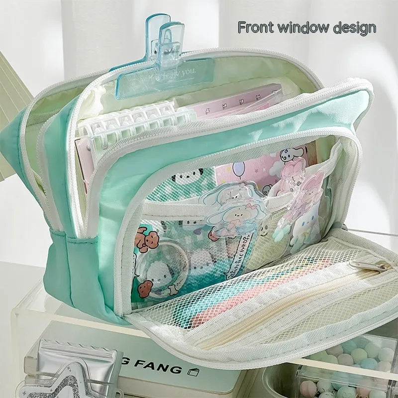 Double layer zippered pencil case in blue, cream, green, or pink with a gift handle