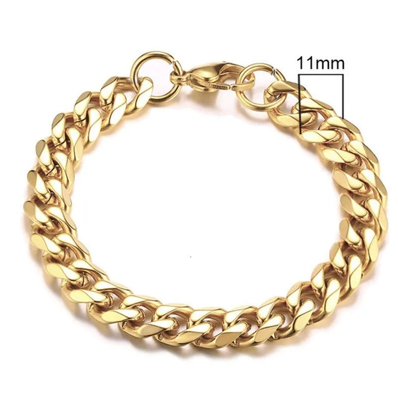 Geometric six-sided Cuban link metal bracelet in gold colour on a wrist.