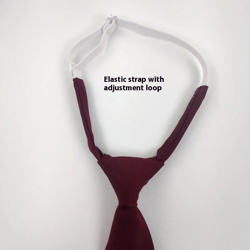 Men's solid colour cotton bow tie in arrow style, showing navy blue option.