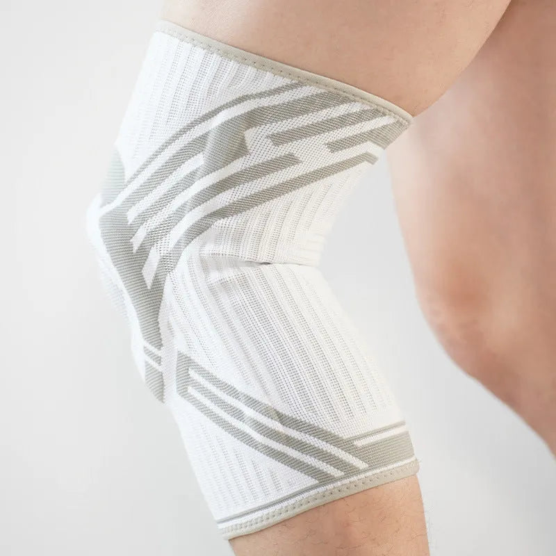 Blue high elasticity cotton knee pad for adult basketball and sports protection.