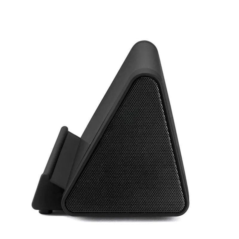 Black and white wireless mini Bluetooth portable speaker for mobile phones and computers.