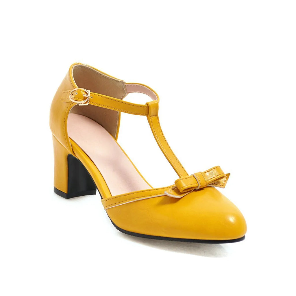 Women's chunky heel sandals with bow tie design and adjustable buckle strap in apricot colour