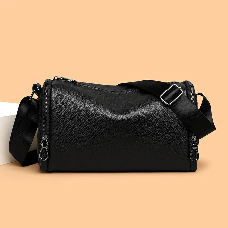 Genuine leather crossbody shoulder bag for men in black with stitching detail and large capacity interior