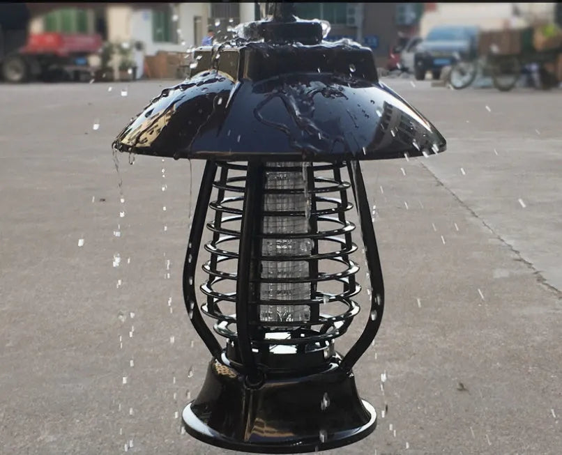 White solar-powered electronic mosquito lamp with solar panel and purple switch for garden outdoor use.