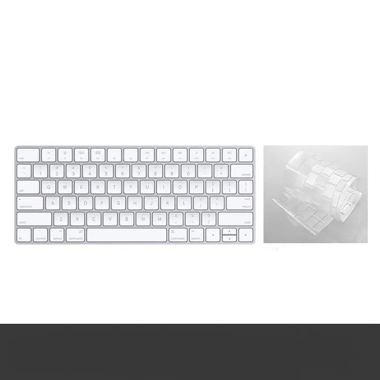 White Apple Bluetooth wireless keyboard with ultra-thin metal casing on a desk.