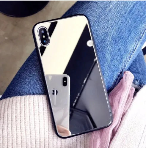 Black mirror back cover phone case for iPhone X showing reflective surface.