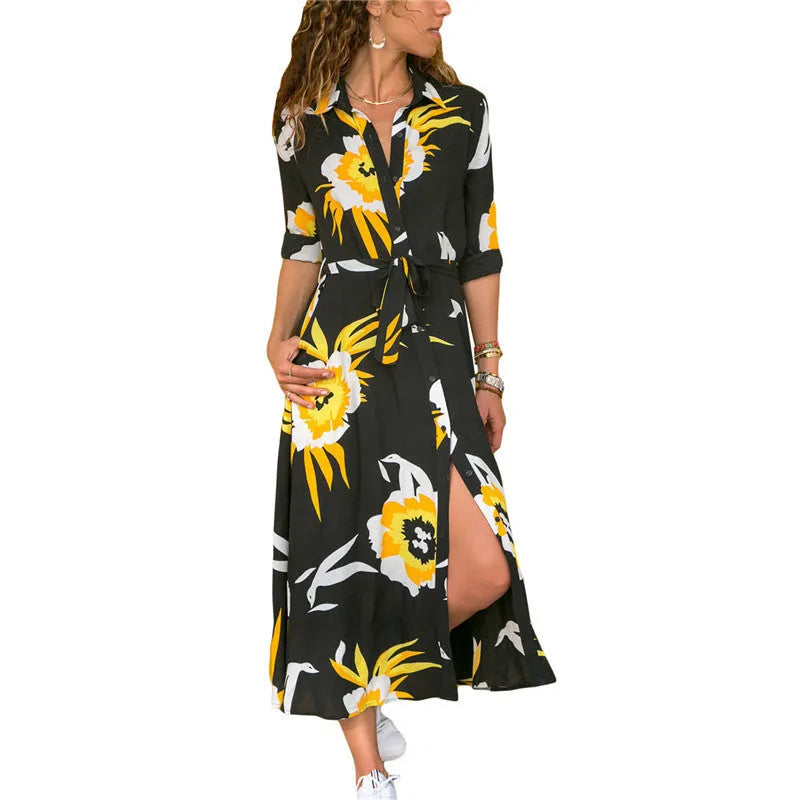Women's printed chiffon maxi dress with V-neck and A-line skirt on a hanger.