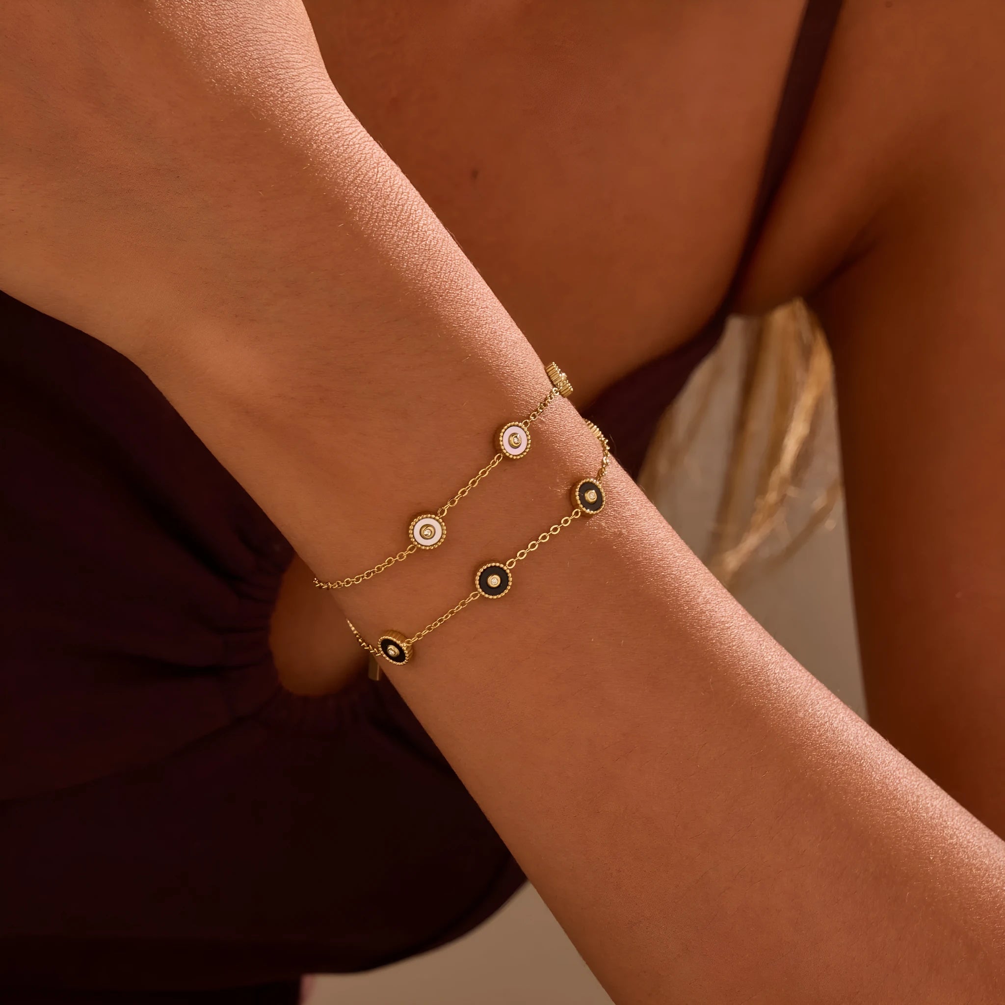Stainless steel women's bracelet with 18K gold plating and geometric fritillary design