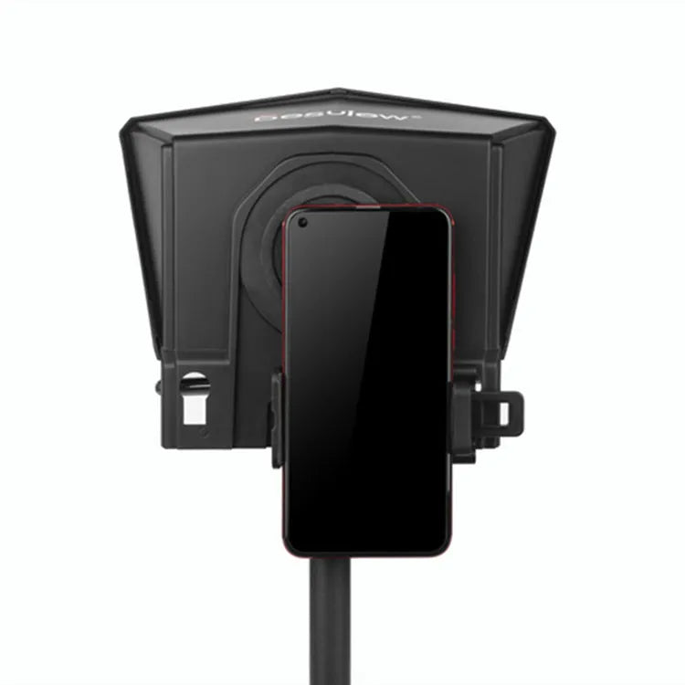 Portable small black cell phone teleprompter with adapter rings and remote control on a table