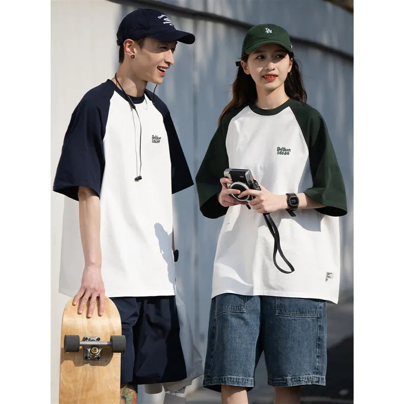 Men's loose blue raglan sleeve T-shirt made from thin polyester blend fabric.